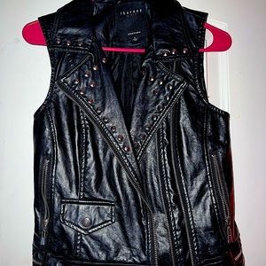 Black leather studded vest